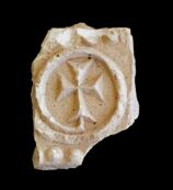 Sir Bani Yas - Decorated plaster tile from the monastery (site SBY9)  (Photograph by Dr Mark Beech)